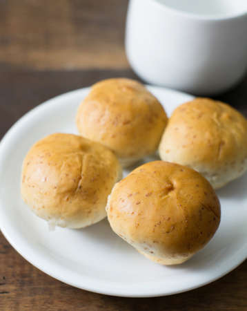 mushroom bread on white dish and coffee cupの写真素材