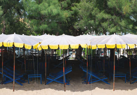chairs and umbrella on the beach for relaxingの写真素材