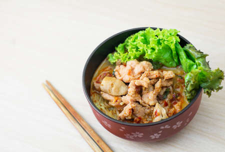 spicy pork noodle, thai style call tomyumの写真素材