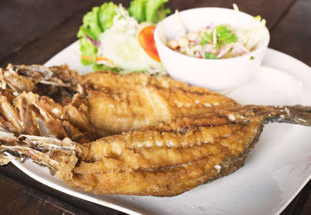 Fried Snapper topped with sauce