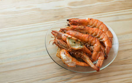 roasted prawn on wood tableの写真素材