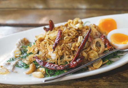 spicy salad with boiled eggの写真素材