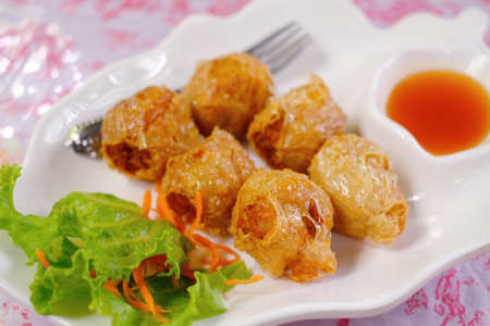 deep fried crab roll with sweet sauceの写真素材