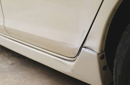 Scratches of backside of white carの写真素材