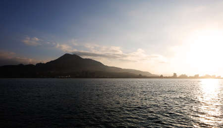 view of lake with moutain when sunsetの写真素材