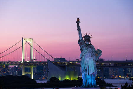 Odaiba, Tokyo 2018 June, 2: View of Statue of Liberty with rainbow bridge background in Odaiba area, Tokyo, Japanの写真素材