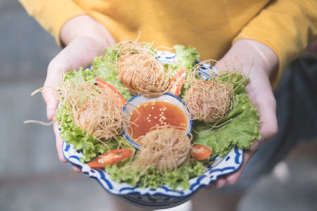 minced pork fried with noodle, thai street foodの写真素材
