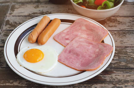 set of morning breakfast on wood tableの写真素材
