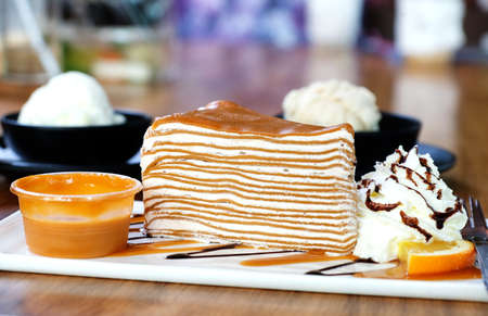 thai tea crepe cake with creamの写真素材