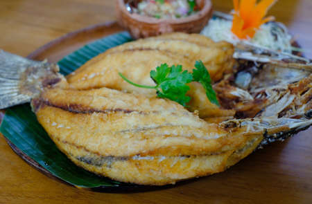 stir fried seabass fish with spicy sauceの写真素材