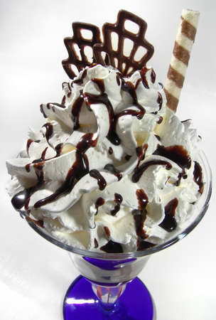 Exotic fruits in a glass with ice cream. Chocolate.の写真素材