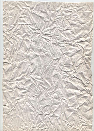 Old grunge wrinkled paper with folds and stainsの写真素材