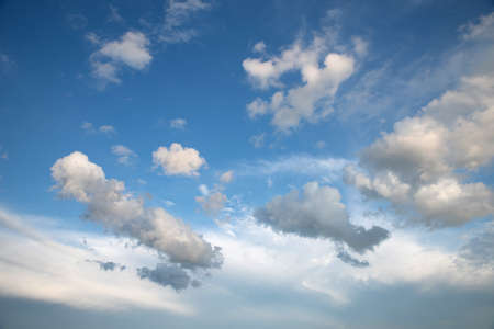 Blue sky with clouds and sun.の写真素材