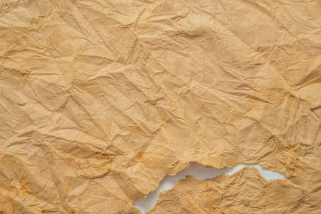 Old grunge paper texture The texture of the paper is wet, old, yellowed with time. Torn, stained.の写真素材