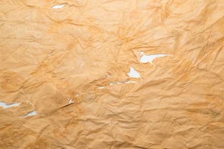 Old grunge paper texture The texture of the paper is wet, old, yellowed with time. Torn, stained.の写真素材