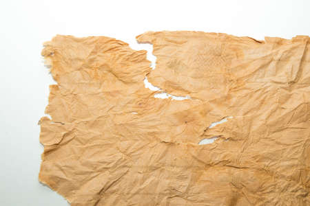 Old grunge paper texture The texture of the paper is wet, old, yellowed with time. Torn, stained.の写真素材