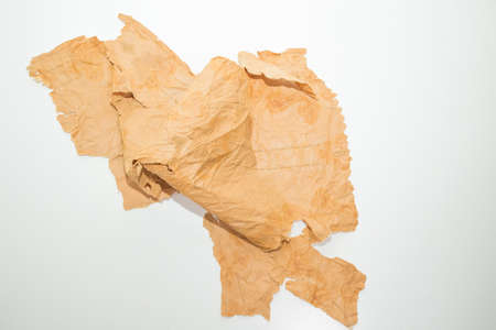Old grunge paper texture The texture of the paper is wet, old, yellowed with time. Torn, stained.の写真素材