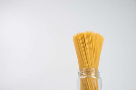 Raw spaghetti on white background.の写真素材