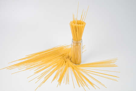 Raw spaghetti on white background.の写真素材
