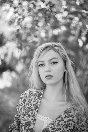 Lutsk. Ukraine. August 25, 2019; Beautiful blonde girl in a birch forest. Selective focus. Soft focus. Blurred background.のeditorial素材