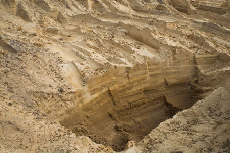 Sand quarry. Texture. Traces of production.
