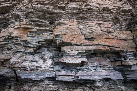 Geologic rock formation, stone background The texture of a rocky rock.