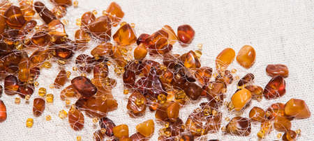 Jewelry made of natural amber stones. Selective focus.の写真素材