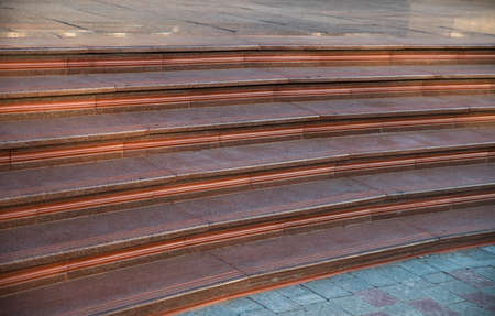 Fragment of red stone steps.