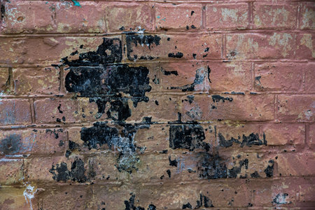 old cement plaster walls with traces of falling paint. Element of design. Background and...