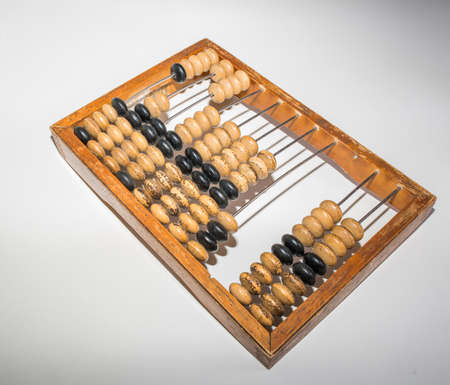 Old wooden abacus on pure white background