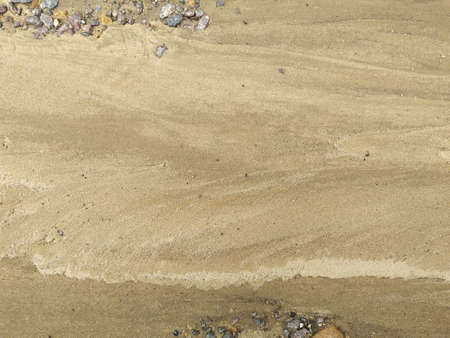 The texture of clay and sand after the rain. Close-up.の写真素材