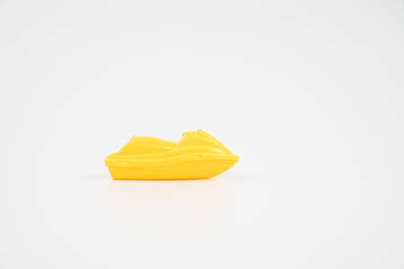 Yellow plastic toy boat.の写真素材