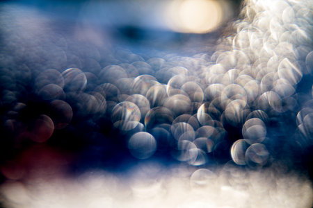 Sunny bokeh from drops on misted glass. light effect. abstract fantasy background.の写真素材