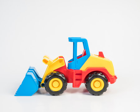 Plastic toy models of construction vehicles. Bulldozer.の写真素材