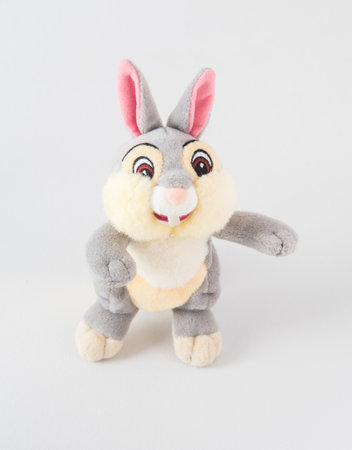 Plush rabbit with pink ears. Soft toy for children on a white background.の写真素材