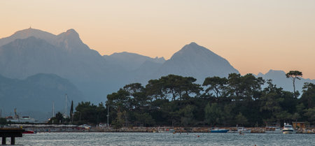 Kemer. Turkiye. September 6 2020. Mountains and coastline in haze at sunset.のeditorial素材