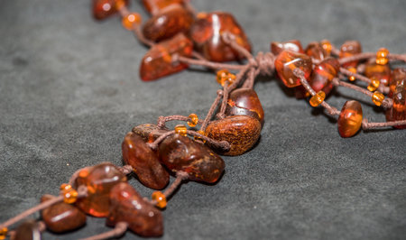 Jewelry made of natural amber stones. Selective focus.の写真素材