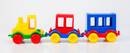 Plastic toy steam locomotive with carriages