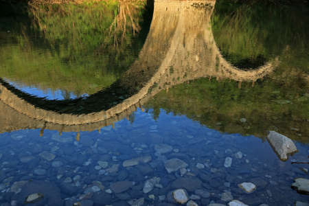 Old Stone Bridge called Plakida or Kalogeriko in Zagori area, Epirus, Greece