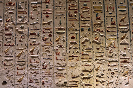 Egyptian hieroglyphs on the wall of an ancient temple, KV 2 the tomb of Ramses IV in Valley of the...