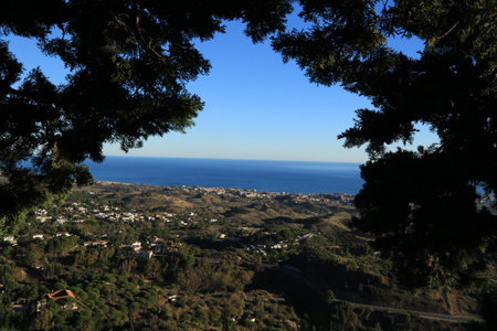 View from the top of the mountain to the sea and the village, Landscape of Costa Sol coast, view from Mijas, Spainの写真素材