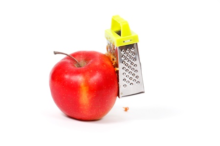 Red apple which Grate, on a white backgroundの写真素材