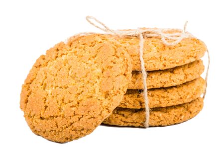 Oat cookies with linen rope isolated on white background