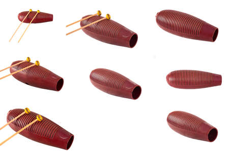 one guiro percussion instrument isolated on white backgroundの写真素材