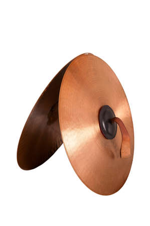 Close up of an prcussion cymbals with leather handle  isolated on background.の写真素材