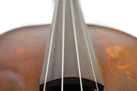 one violin image .old brown stringed wooden instrument close up viewの写真素材