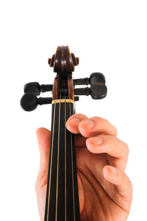 Image violin lies in a human hand.String instrument isolated on white background.Fingers play music