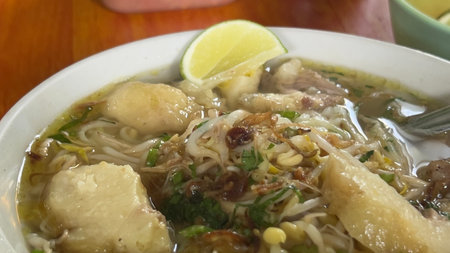 Thai style noodle soup with pork and fish ball in bowlの写真素材