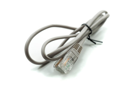 Gray LAN network connection  cable. Internet cord RJ45 isolated on white background