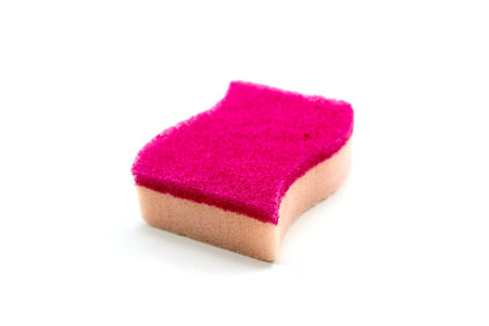 Scrub sponge for household chores and all-purpose dishwashing isolated on a white background.の写真素材